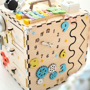 Wooden busy cube toddler toy